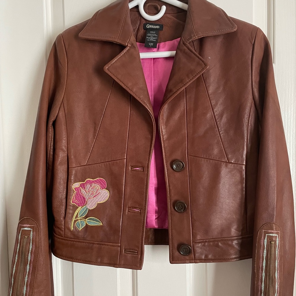 Guess leather embroidered with roses jacket. Size small.